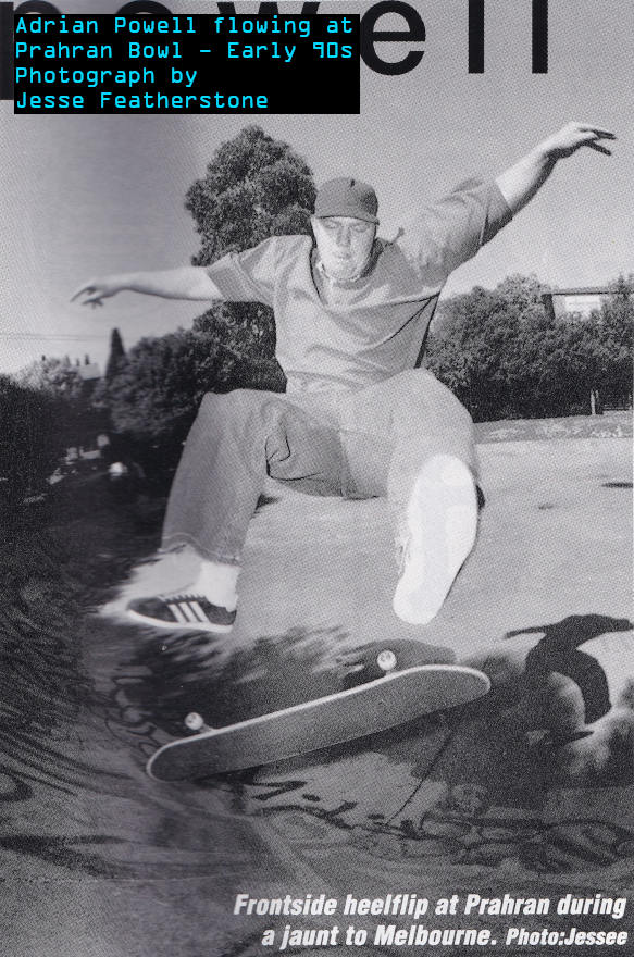Black and White photo of Adrian Powell doing a Frontside Heel Flip on a large enbankment at Prahran Bowl.
    Adrian is wearing classic 90s skate wear... A baseball cat, baggy jeans and Adidas Gazelle sneakers.