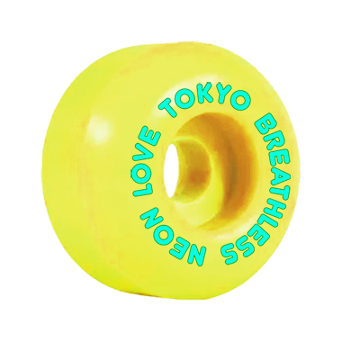 Bright yellow skateboard wheel with text on tthe circumference of the wheel reading... 
        TOKYO BREATHLESS NEON LOVE in a mint green color.